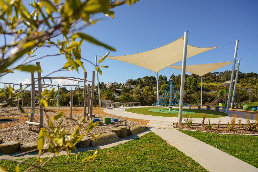 Inclusive safety surfacing for playgrounds.